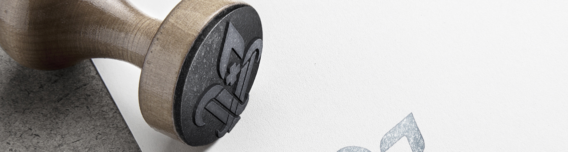 View of Vieux Care's logo stamp, designed by Entermotion, a Wichita web-design studio.